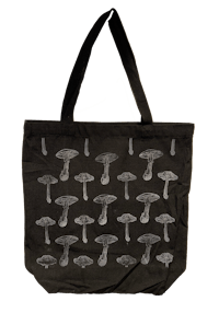a black tote bag with mushrooms on it