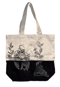 a black and white tote bag with a drawing on it