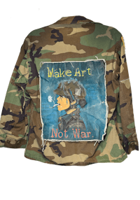 a camouflage jacket that says make art not war